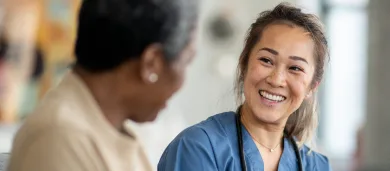 Female doctor talking to male patients