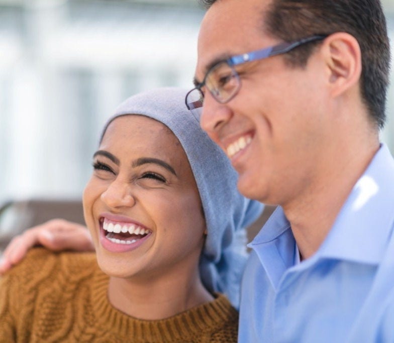 Patient and family member embracing